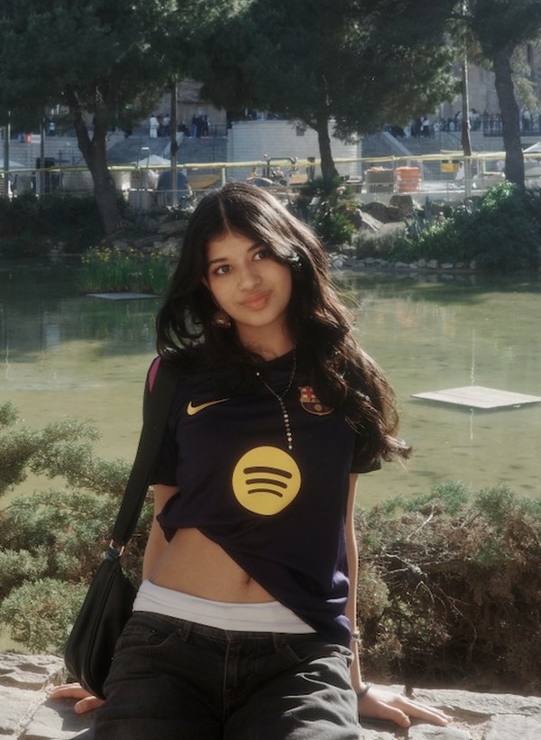 Vaidehi Jatia sitting by a pond